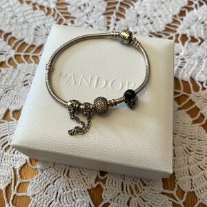 Pandora bracelet with few charms